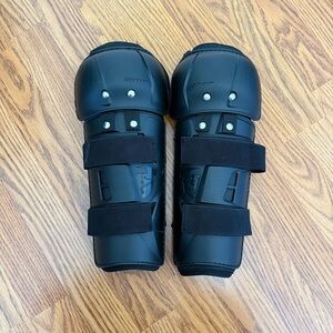 Black Protective Shin Guards with Strap Closure